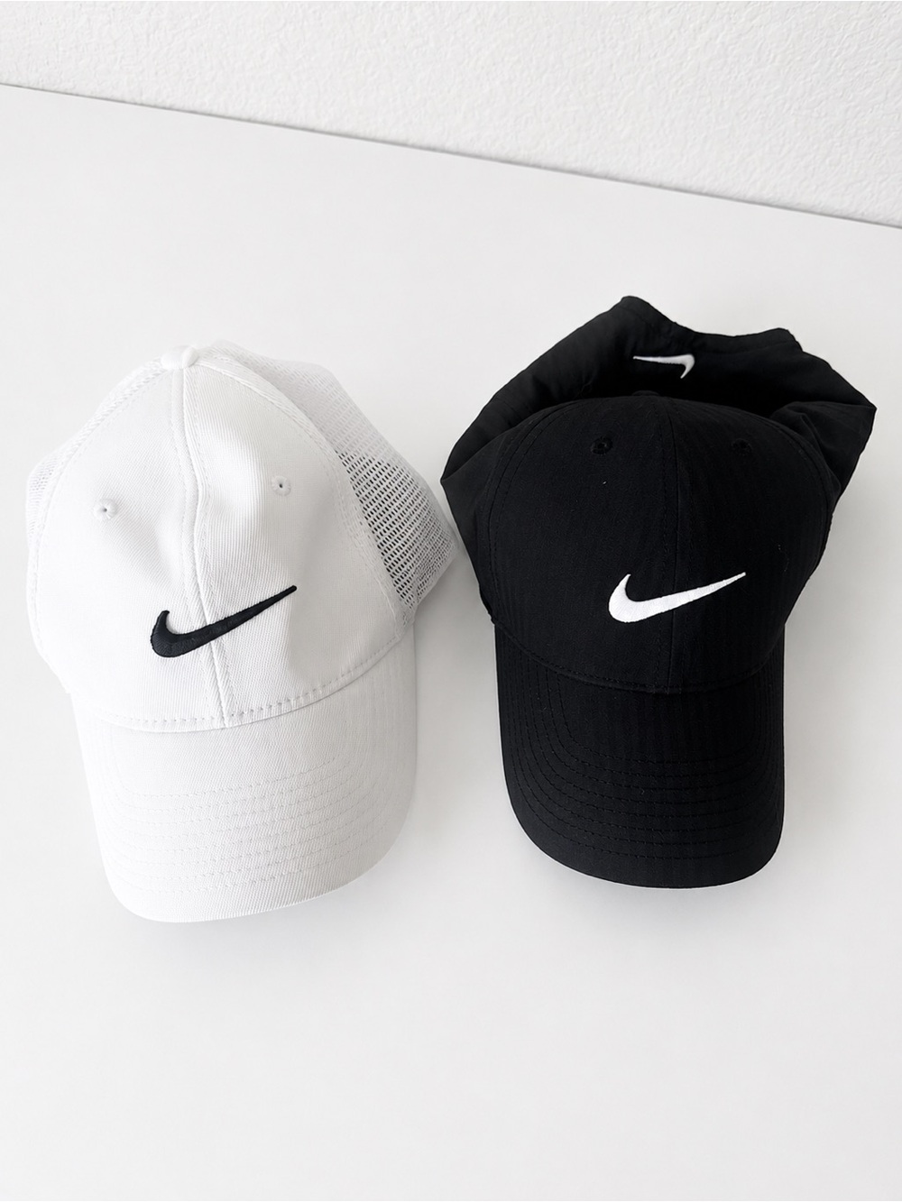 Nike Swoosh Baseball Caps in Black & White